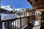 Enjoy breathtaking mountain views from this charming chalet.