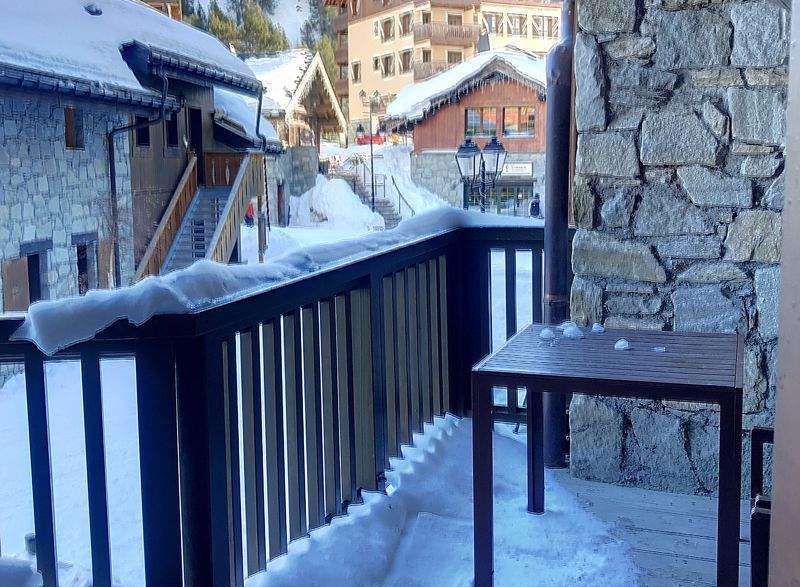Enjoy breathtaking mountain views from this charming balcony.