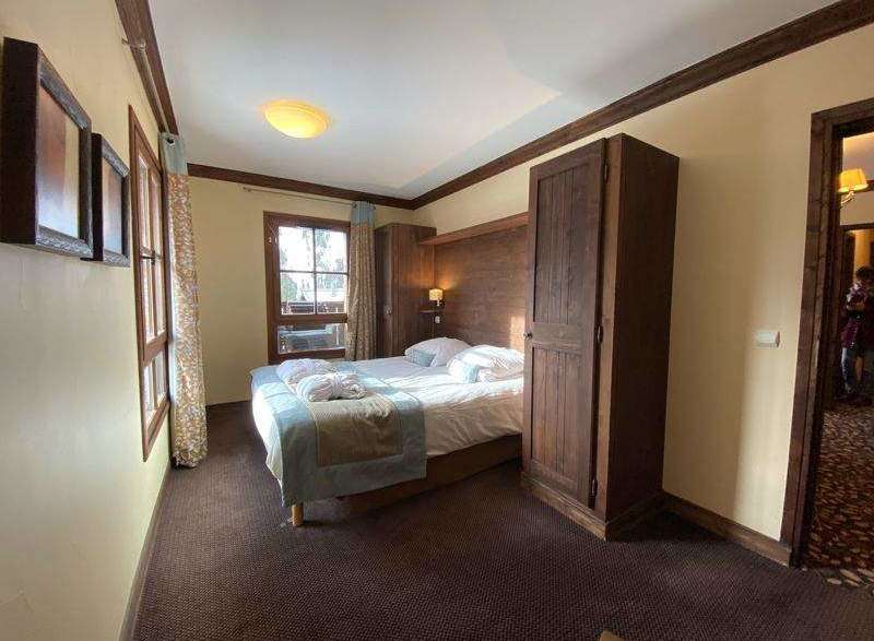 Discover a cozy bedroom with a touch of rustic charm.