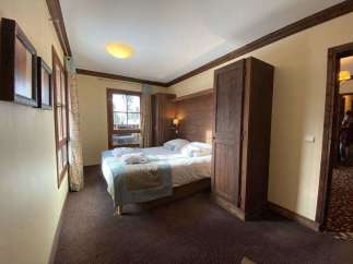 Discover a cozy bedroom with a touch of rustic charm.