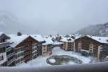 Experience the ultimate winter getaway in this stunning property nestled in a snowy landscape.