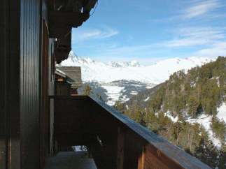 Enjoy breathtaking mountain views from this stunning chalet.