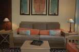 Cozy living room with a comfortable sofa, perfect for relaxation.