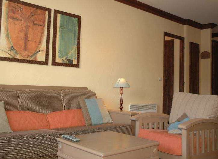 Cozy living room with comfortable seating and inviting decor.