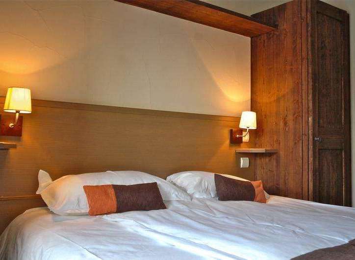 Cozy bedroom with a warm and inviting atmosphere.
