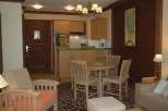 Cozy living space with a dining area and kitchen.