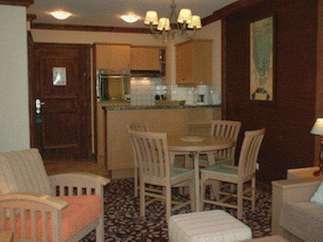 Cozy living space with a dining area and kitchen.