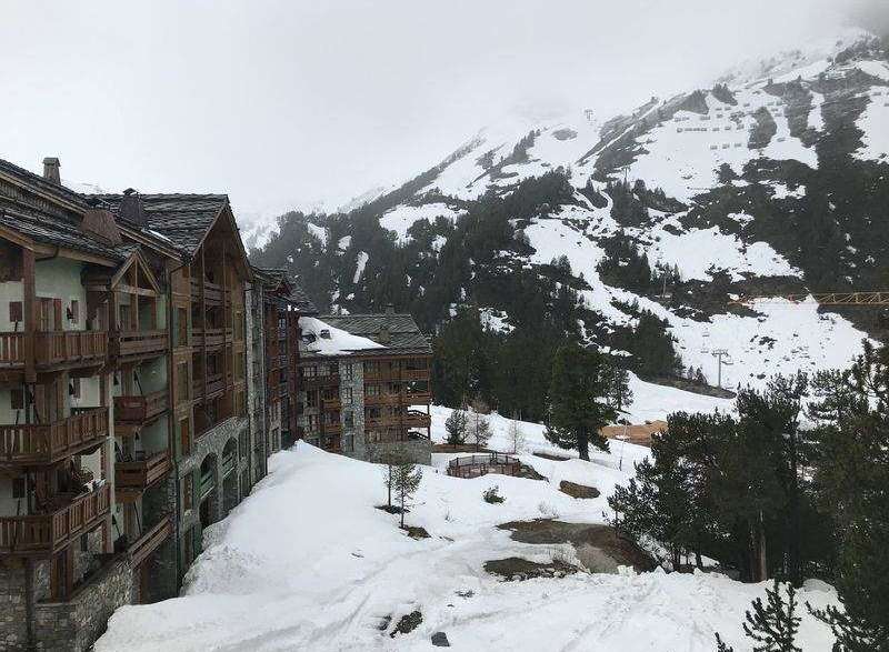 Discover the charm of this stunning mountain property, perfectly nestled amidst a snowy landscape.
