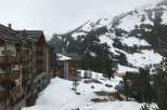 Discover the charm of this stunning mountain property, perfectly nestled amidst a snowy landscape.