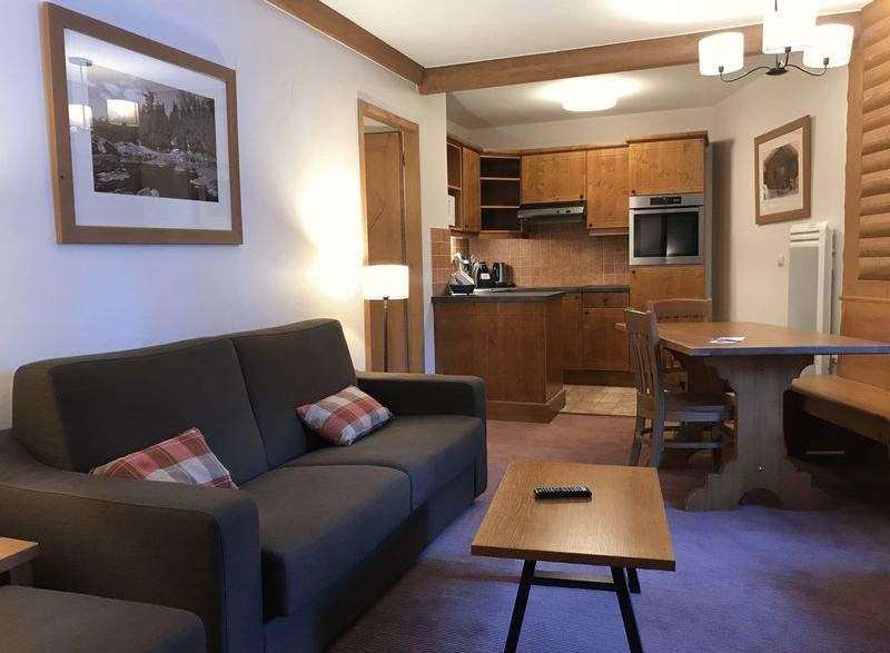 Cozy living space with a comfortable sofa and charming decor.