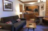 Cozy living space with a comfortable sofa and charming decor.