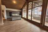 Discover a stunning modern kitchen with sleek cabinetry and an island, perfect for culinary enthusiasts.
