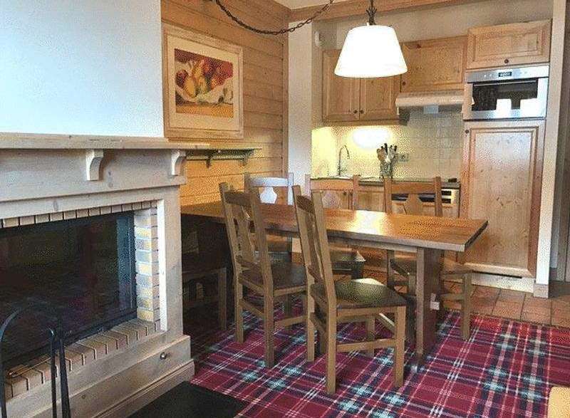 Cozy up in this charming property featuring a warm fireplace, perfect for chilly evenings.