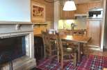 Cozy up in this charming property featuring a warm fireplace, perfect for chilly evenings.