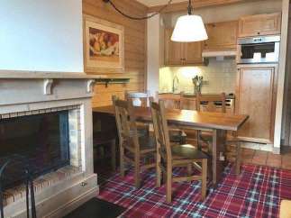 Cozy up in this charming property featuring a warm fireplace, perfect for chilly evenings.
