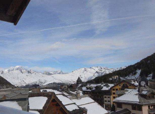 Enjoy breathtaking mountain views from this charming property.