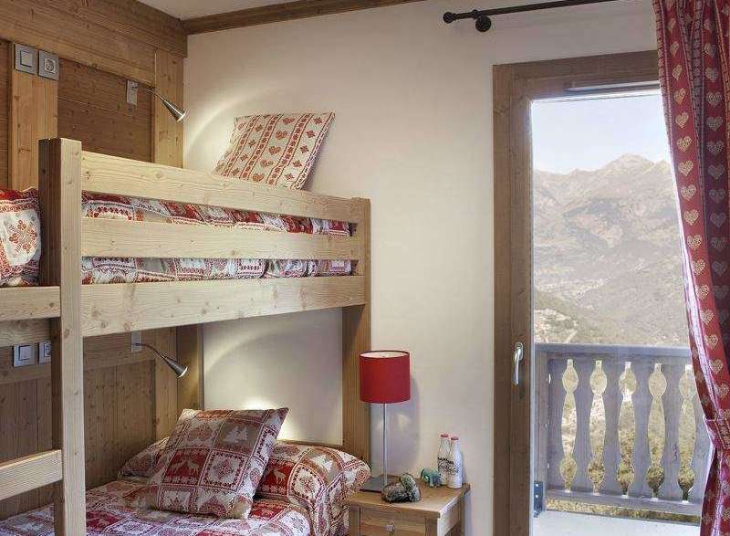 Cozy bedroom with bunk beds, perfect for a family getaway.