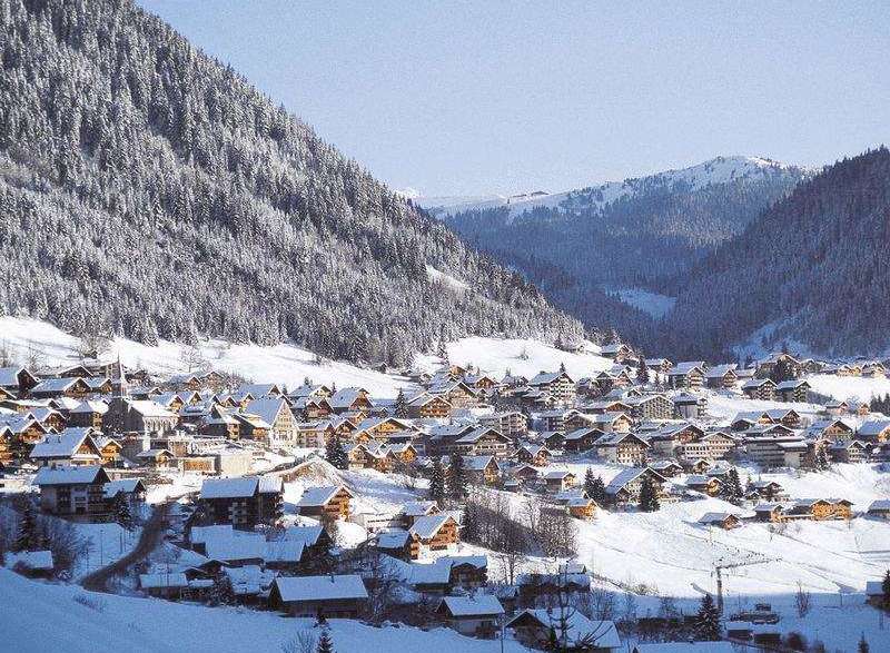 Nestled in a picturesque mountain valley, this charming village offers a serene winter escape.