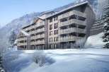 Discover the charm of this stunning mountain property, perfectly nestled in a snowy landscape.