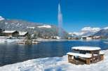 Experience the serene beauty of this lakeside property, perfect for a winter getaway.