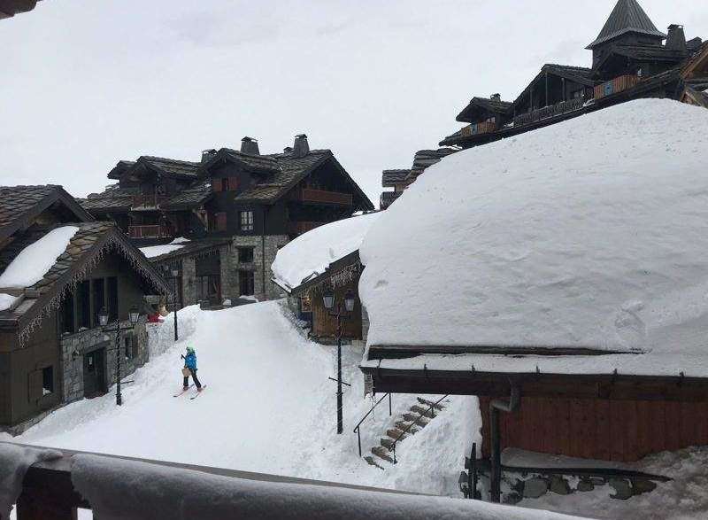 Experience the charm of a snow-covered village with stunning architecture.