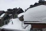 Experience the charm of a snow-covered village with stunning architecture.
