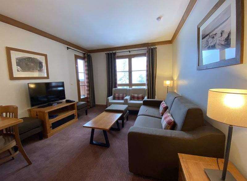Cozy living room with a comfortable sofa and stylish decor.