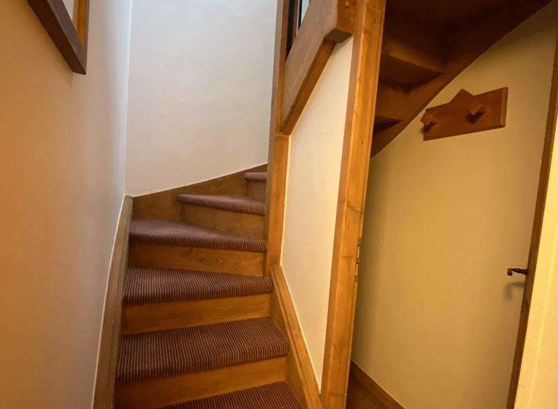 Discover the charm of this cozy property featuring a beautifully designed staircase.