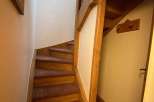 Discover the charm of this cozy property featuring a beautifully designed staircase.