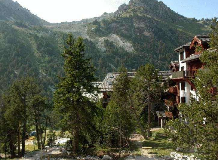 Nestled amidst the majestic mountains, this property offers a serene escape.