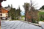 Discover the charm of this property with its stunning slate roof and picturesque mountain views.