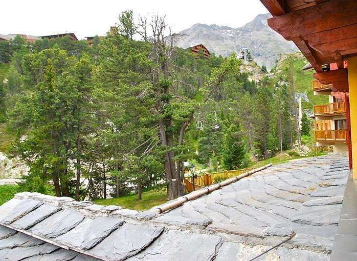 Enjoy breathtaking mountain views from this charming property.