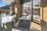 Enjoy breathtaking mountain views from this stunning balcony.