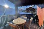 Enjoy breathtaking mountain views from this charming balcony.