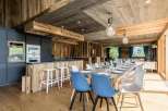 Experience rustic elegance in this stunning property, showcasing exquisite wooden interiors and a warm, inviting atmosphere.