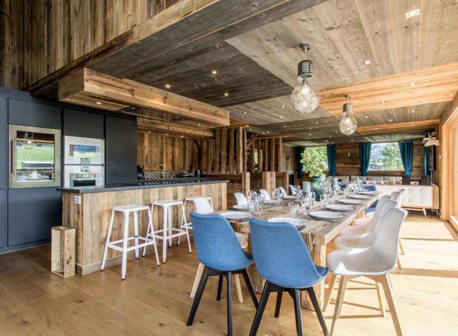 Experience rustic elegance in this stunning property, showcasing exquisite wooden interiors and a warm, inviting atmosphere.