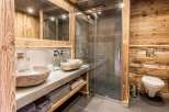 Experience rustic luxury in this stunning bathroom.