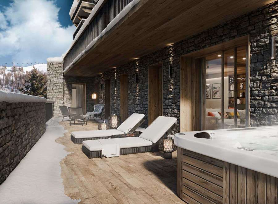 Experience luxury living with this stunning property featuring a private balcony and a relaxing hot tub.