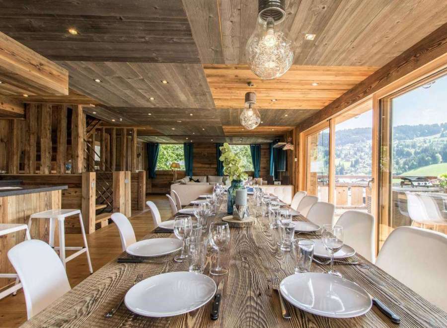 Experience luxury living in this stunning property, featuring a beautifully designed dining area perfect for entertaining.