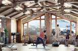 Luxury chalet gym with stunning mountain views.
