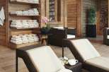 Relax and unwind in our luxurious spa, featuring comfortable lounge chairs and plush towels.