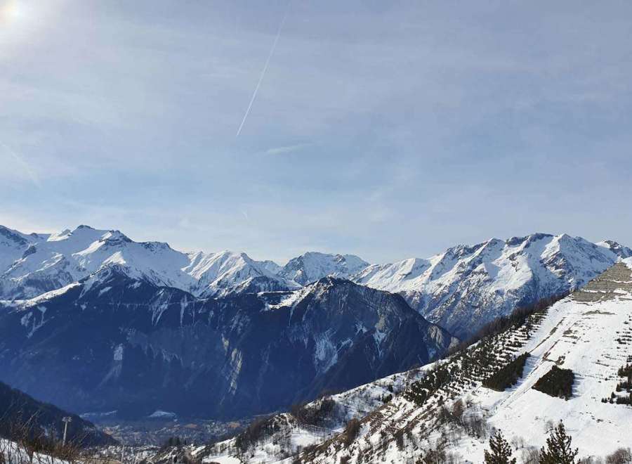 Experience the breathtaking beauty of the snow-capped mountains.