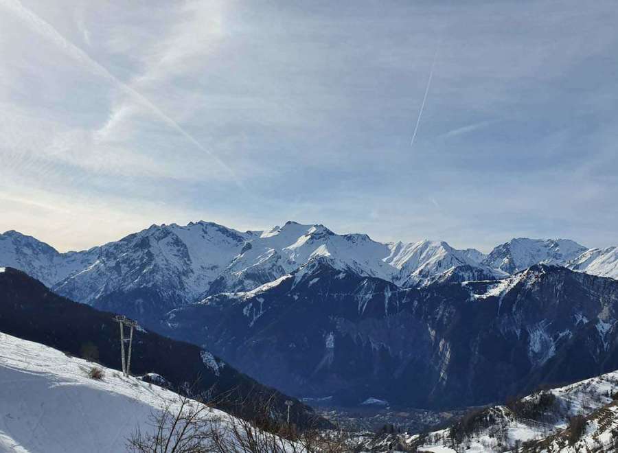 Experience the breathtaking beauty of the snow-capped mountains.