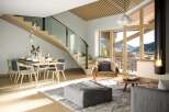This stunning property boasts a modern open-plan design with breathtaking mountain views.