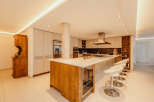 This stunning kitchen boasts a modern design with a spacious island, perfect for entertaining.