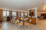Step into a world of rustic elegance with this stunning dining room.