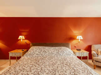Cozy bedroom with a warm, inviting atmosphere.