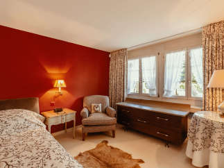 Cozy bedroom with a warm, inviting atmosphere.