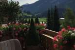 Enjoy breathtaking mountain views from this charming balcony.
