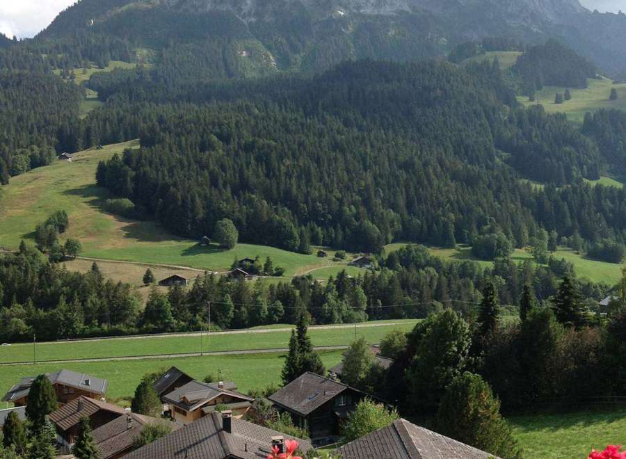 Nestled in a picturesque mountain setting, this property offers stunning views of the surrounding landscape.
